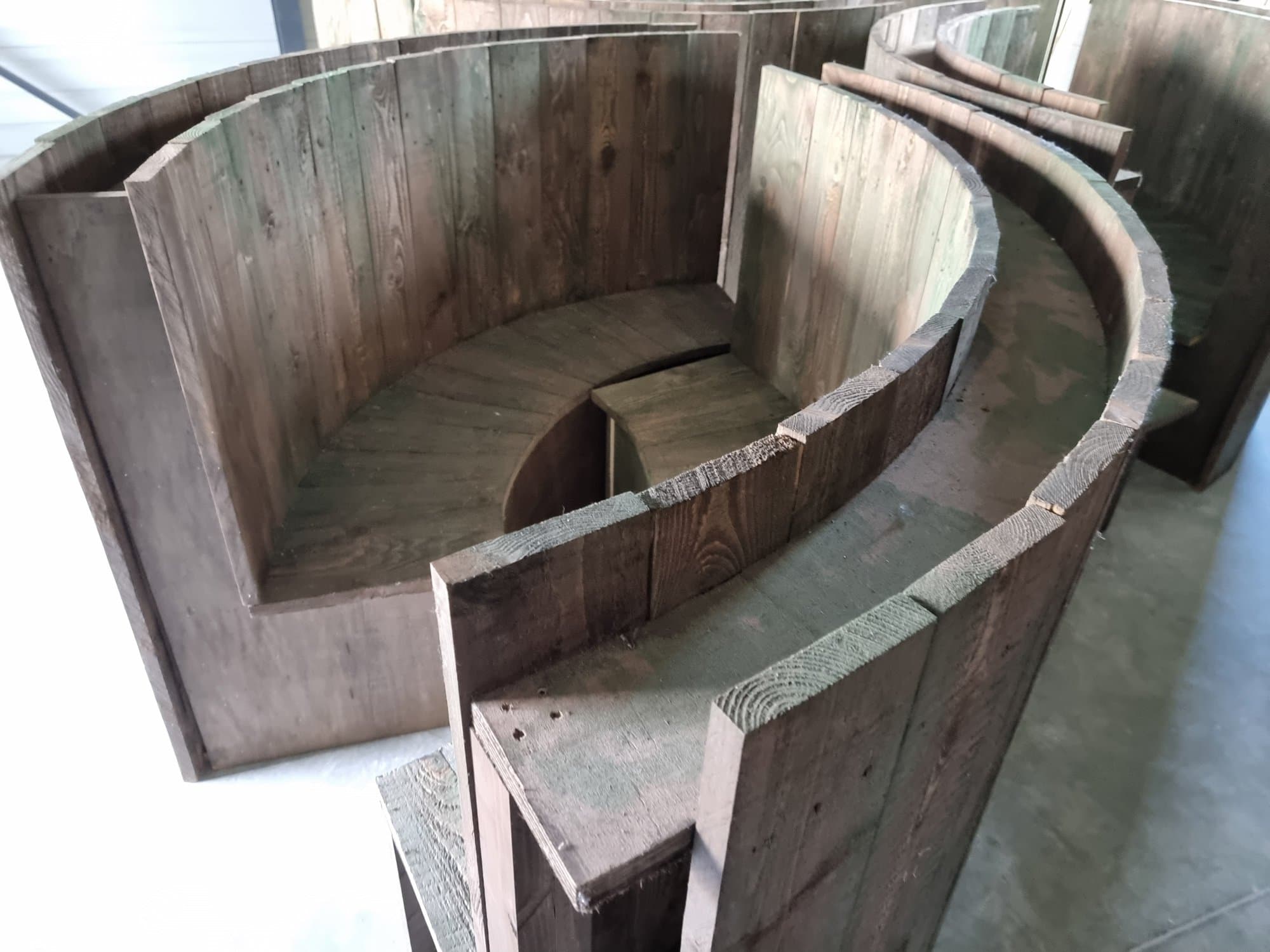 The bar's curved banquette, assembled in the workshop before delivery