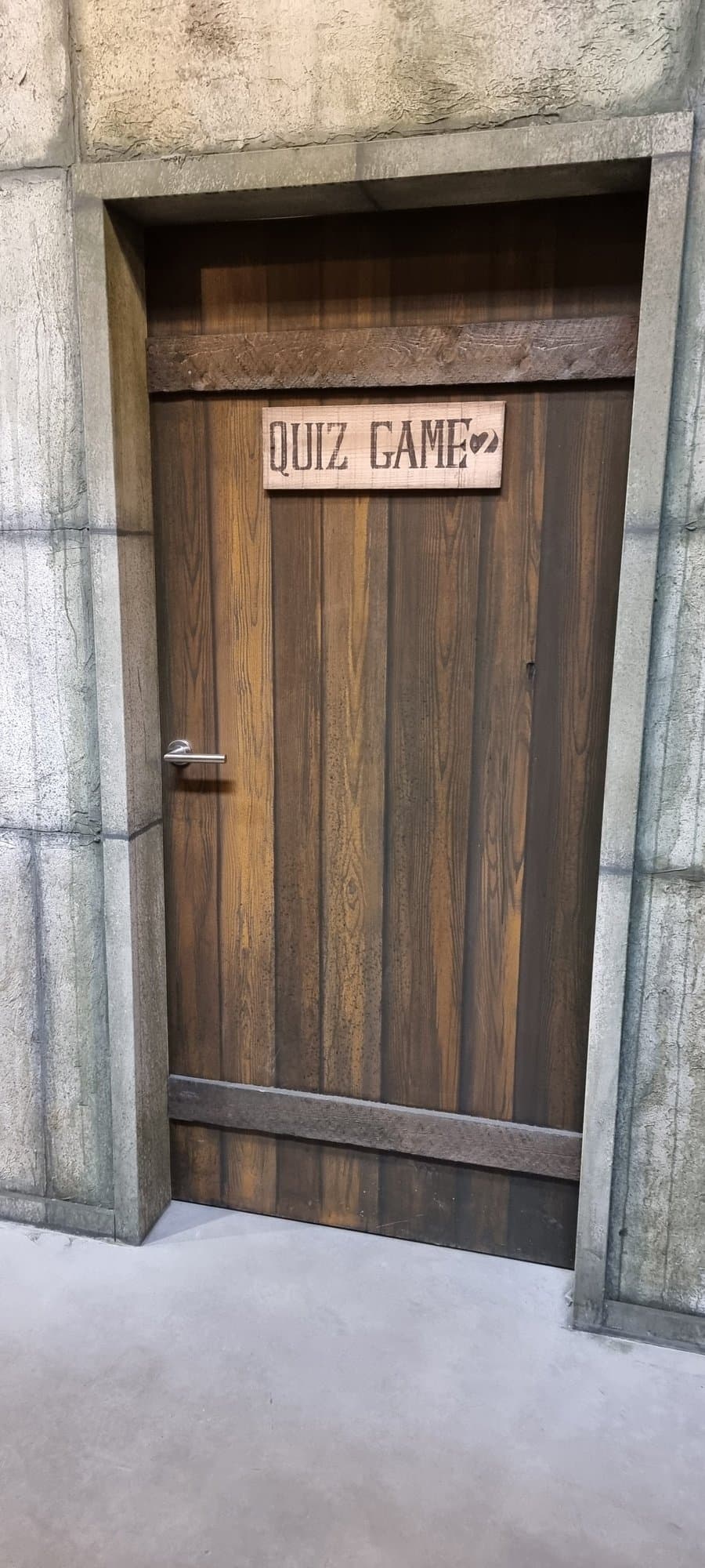 The door to the quiz game room, set into the stone decoration